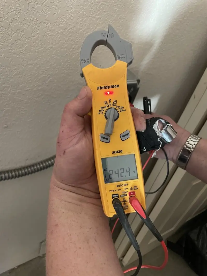 Voltage testing with clamp meter during Generator Installation in Imperial Beach